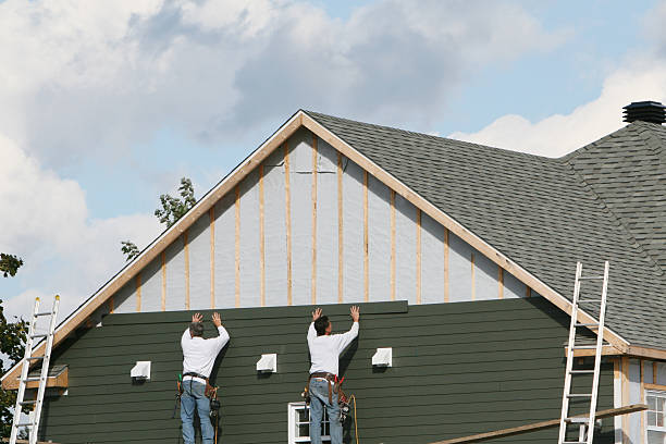 Professional Siding Replacement technician working in Newtonville, MA